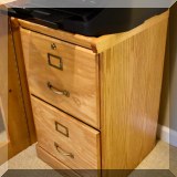 F29. Oak two-drawer file cabinet. 